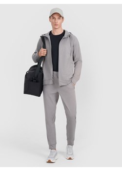 Męskie spodnie treningowe 4F 4FWMM00TFTRM1067 - szare ze sklepu Sportstylestory.com w kategorii Spodnie męskie - zdjęcie 184941344