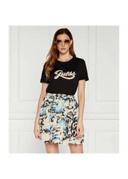 GUESS T-shirt GLITTERY LOGO | Regular Fit ze sklepu Gomez Fashion Store w kategorii Bluzki damskie - zdjęcie 184972322
