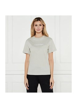 Calvin Klein T-shirt HERO | Regular Fit ze sklepu Gomez Fashion Store w kategorii Bluzki damskie - zdjęcie 184984081