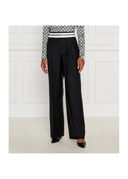 Marc Cain Spodnie chino | flare fit | z dodatkiem wełny ze sklepu Gomez Fashion Store w kategorii Spodnie damskie - zdjęcie 185002851