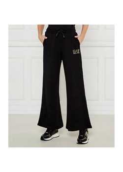 EA7 Spodnie dresowe | flare fit ze sklepu Gomez Fashion Store w kategorii Spodnie damskie - zdjęcie 185003430