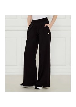 EA7 Spodnie dresowe | Loose fit ze sklepu Gomez Fashion Store w kategorii Spodnie damskie - zdjęcie 185004804