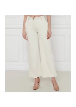 Marciano Guess Spodnie NAOMI | flare fit ze sklepu Gomez Fashion Store w kategorii Spodnie damskie - zdjęcie 185005452