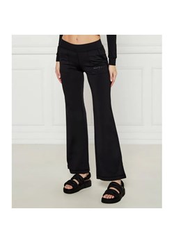 Juicy Couture Spodnie dresowe FARAH | flare fit | low rise ze sklepu Gomez Fashion Store w kategorii Spodnie damskie - zdjęcie 185006904