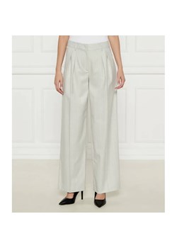 Marc Cain Spodnie WICHITA | flare fit | z dodatkiem wełny ze sklepu Gomez Fashion Store w kategorii Spodnie damskie - zdjęcie 185007571