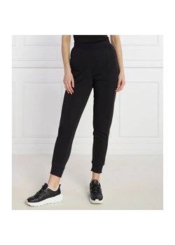 Calvin Klein Performance Spodnie dresowe | Regular Fit ze sklepu Gomez Fashion Store w kategorii Spodnie damskie - zdjęcie 185007690