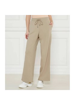 MM Spodnie dresowe Veles | flare fit ze sklepu Gomez Fashion Store w kategorii Spodnie damskie - zdjęcie 185008241