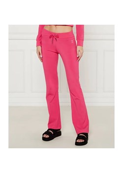 Juicy Couture Spodnie dresowe APOLLO | flare fit | low rise ze sklepu Gomez Fashion Store w kategorii Spodnie damskie - zdjęcie 185008273