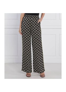 Karl Lagerfeld Spodnie PRINTED MONOGRAM | flare fit | high waist ze sklepu Gomez Fashion Store w kategorii Spodnie damskie - zdjęcie 185010603