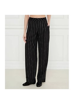 Marc Cain Spodnie | flare fit | z dodatkiem lnu ze sklepu Gomez Fashion Store w kategorii Spodnie damskie - zdjęcie 185011000