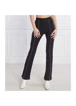 Tommy Jeans Spodnie SEAM DETAIL | flare fit ze sklepu Gomez Fashion Store w kategorii Spodnie damskie - zdjęcie 185013020