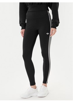 adidas Legginsy adicolor 3-Stripes JX5242 Szary Slim Fit ze sklepu MODIVO w kategorii Spodnie damskie - zdjęcie 185040841