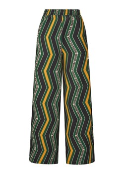 adidas Spodnie dresowe FARM Tiro JL8615 Kolorowy Loose Fit ze sklepu MODIVO w kategorii Spodnie damskie - zdjęcie 185056510