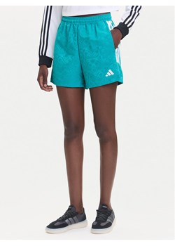 adidas Szorty sportowe Tiro x Common Goal JL9208 Turkusowy Loose Fit ze sklepu MODIVO w kategorii Szorty - zdjęcie 185371770