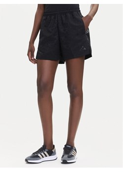 adidas Szorty sportowe Tiro x Common Goal JL9205 Czarny Loose Fit ze sklepu MODIVO w kategorii Szorty - zdjęcie 185371814