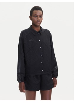 adidas Kurtka przejściowa Tiro x Common Goal Coaches JL7647 Czarny Loose Fit ze sklepu MODIVO w kategorii Kurtki damskie - zdjęcie 185373743