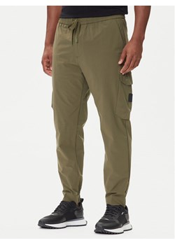 BOSS Spodnie dresowe T_Urbanex-Cargolight 50508339 Zielony Regular Fit ze sklepu MODIVO w kategorii Spodnie męskie - zdjęcie 185391223
