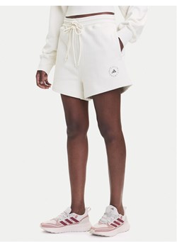 adidas by Stella McCartney Szorty sportowe True Casuals JX6786 Beżowy Loose Fit ze sklepu MODIVO w kategorii Szorty - zdjęcie 185391264