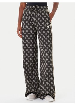 Guess Spodnie dresowe V5YB10 K0282 Zielony Relaxed Fit ze sklepu MODIVO w kategorii Spodnie damskie - zdjęcie 185444080