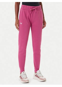 Under Armour Spodnie dresowe Ua Rival 1379438 Różowy Loose Fit ze sklepu MODIVO w kategorii Spodnie damskie - zdjęcie 185469574