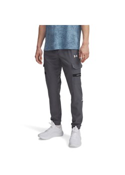 Męskie spodnie treningowe Under Armour UA Tech Utility Woven - szare ze sklepu Sportstylestory.com w kategorii Spodnie męskie - zdjęcie 185482804