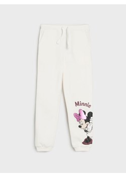 Sinsay - Spodnie dresowe Minnie Mouse - różowy ze sklepu Sinsay w kategorii Spodnie dziewczęce - zdjęcie 185493883