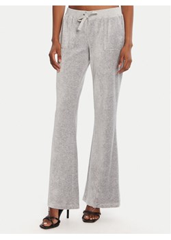 Juicy Couture Spodnie dresowe Caisa JCSEBJ008 Szary Slim Fit ze sklepu MODIVO w kategorii Spodnie damskie - zdjęcie 185510453