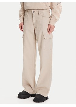 G-Star Raw Spodnie materiałowe Judee D24673-E078 Beżowy Relaxed Fit ze sklepu MODIVO w kategorii Spodnie damskie - zdjęcie 185521600