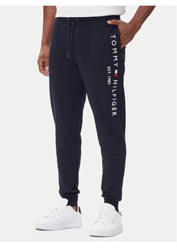 Tommy Hilfiger Spodnie dresowe Basic Branded MW0MW08388 Granatowy Regular Fit ze sklepu MODIVO w kategorii Spodnie męskie - zdjęcie 185570623