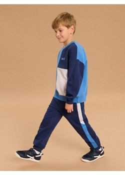 Sinsay - Spodnie loose - mid blue - id: 986FS-52X - marki Sinsay - 185580940 Sinsay - Spodnie loose - mid blue ze sklepu Sinsay w kategorii Spodnie chłopięce - zdjęcie 185580940