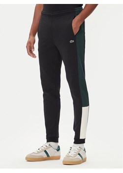 Lacoste Spodnie dresowe XH5923 Czarny Regular Fit ze sklepu MODIVO w kategorii Spodnie męskie - zdjęcie 185649073