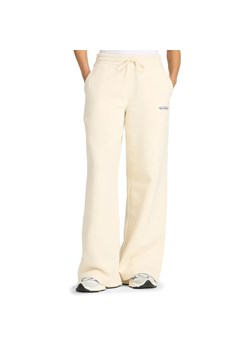 Spodnie damskie New Balance WP53903LIN - beżowe ze sklepu streetstyle24.pl w kategorii Spodnie damskie - zdjęcie 185654741