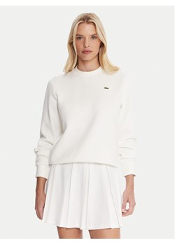 Lacoste Bluza SF5245 Écru Relaxed Fit ze sklepu MODIVO w kategorii Bluzy damskie - zdjęcie 185669931