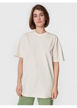 New Balance T-Shirt Athletics Nature State WT23556 Beżowy Relaxed Fit ze sklepu MODIVO w kategorii Bluzki damskie - zdjęcie 185670021
