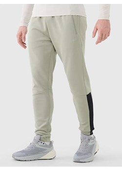 4F Spodnie sportowe w kolorze beżowym ze sklepu Limango Polska w kategorii Spodnie męskie - zdjęcie 185684690