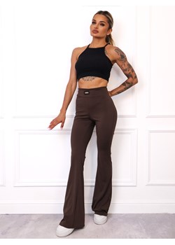 LEGGINSY FLARE Z ROZSZERZANYMI NOGAWKAMI I NASZYWKĄ- BRĄZOWE ze sklepu olika.com.pl w kategorii Spodnie damskie - zdjęcie 185715113