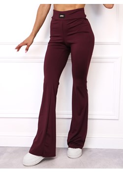 LEGGINSY FLARE Z ROZSZERZANYMI NOGAWKAMI I NASZYWKĄ- BORDOWE ze sklepu olika.com.pl w kategorii Spodnie damskie - zdjęcie 185715200