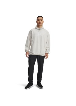 Męskie spodnie treningowe Under Armour UA Unstoppable Tapered Pants - czarne ze sklepu Sportstylestory.com w kategorii Spodnie męskie - zdjęcie 185736812