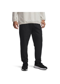 Męskie spodnie treningowe Under Armour UA Unstoppable Tapered Pants - czarne ze sklepu Sportstylestory.com w kategorii Spodnie męskie - zdjęcie 185736813