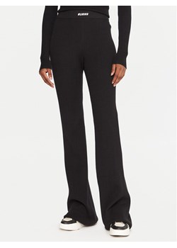 Guess Legginsy V5BB08 Z3JD2 Czarny Flare Fit ze sklepu MODIVO w kategorii Spodnie damskie - zdjęcie 185737471