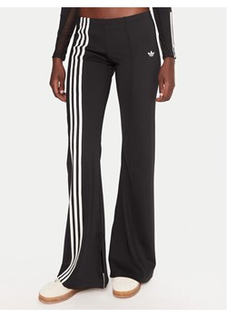 adidas Legginsy Ribbon Off Placed 3-Stripes JX2697 Czarny Flared Fit ze sklepu MODIVO w kategorii Spodnie damskie - zdjęcie 185737693