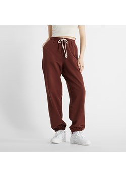Spodnie damskie New Balance WP41513ROK – brązowe ze sklepu New Balance Poland w kategorii Spodnie damskie - zdjęcie 185753113