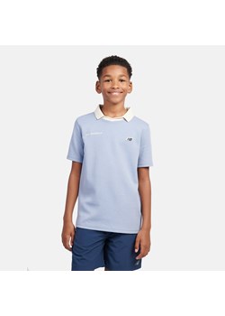 Koszulka dziecięca New Balance LAKB0195DUS – niebieska ze sklepu New Balance Poland w kategorii T-shirty chłopięce - zdjęcie 185753531
