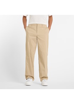 Spodnie męskie New Balance MP43560SOT – beżowe ze sklepu New Balance Poland w kategorii Spodnie męskie - zdjęcie 185754232