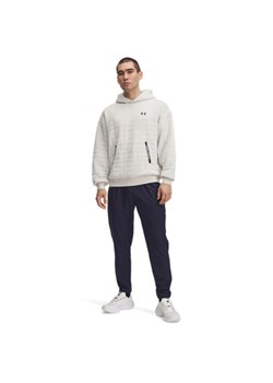 Męskie spodnie treningowe Under Armour UA Unstoppable Tapered Pants - granatowe ze sklepu Sportstylestory.com w kategorii Spodnie męskie - zdjęcie 185755724