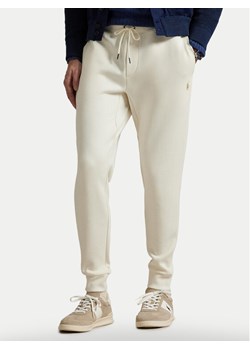 Polo Ralph Lauren Spodnie dresowe 710881518058 Écru Regular Fit ze sklepu MODIVO w kategorii Spodnie męskie - zdjęcie 185793024
