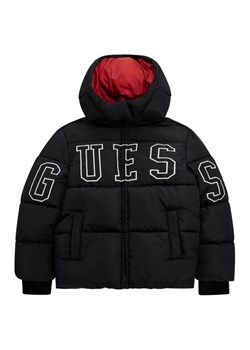 Guess Kids Kurtka zimowa L5BL01 WB240 Czarny Regular Fit ze sklepu MODIVO w kategorii Kurtki chłopięce - zdjęcie 185797294
