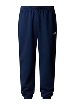 The North Face Spodnie dresowe Simple Dome NF0A8C1W Granatowy Regular Fit ze sklepu MODIVO w kategorii Spodnie męskie - zdjęcie 185833833