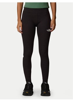 The North Face Legginsy Simple Dome NF0A8C1X Czarny Slim Fit ze sklepu MODIVO w kategorii Spodnie damskie - zdjęcie 185833981