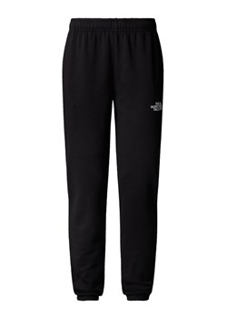 The North Face Spodnie dresowe Simple Dome NF0A8C1Y Czarny Regular Fit ze sklepu MODIVO w kategorii Spodnie damskie - zdjęcie 185833992